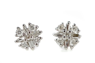 Lot 352 - A PAIR OF DIAMOND CLUSTER EARRINGS