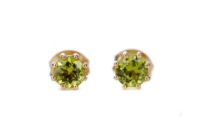 Lot 398 - A PAIR OF PERIDOT STUD EARRINGS