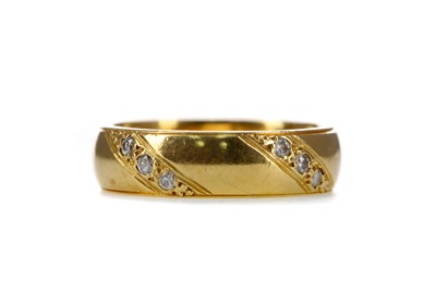 Lot 1325 - A DIAMOND SET WEDDING BAND