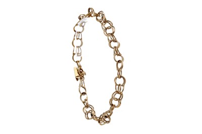 Lot 1340 - A GOLD BRACELET
