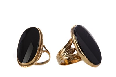Lot 1344 - TWO BLACK ONYX RINGS
