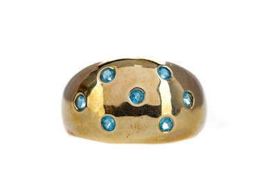 Lot 1354 - A BLUE GEM SET RING