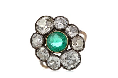 Lot 1371 - AN IMPRESSIVE EMERALD AND DIAMOND RING