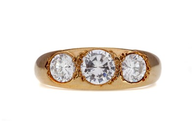 Lot 1467 - A WHITE GEM SET THREE STONE RING