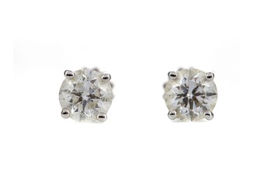 Lot 1502 - A PAIR OF DIAMOND STUD EARRINGS