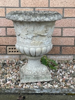 Lot 759 - A COMPOSITION STONE GARDEN URN