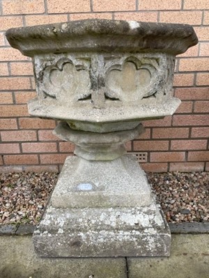 Lot 761 - A PAIR OF COMPOSITION STONE GARDEN URNS