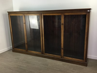 Lot 773 - A LARGE OAK FREESTANDING BOOKCASE