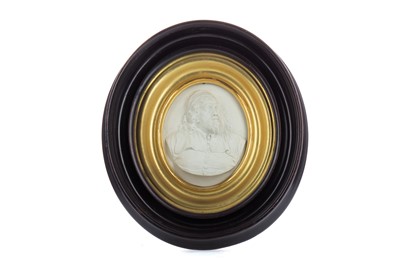 Lot 863 - A WALL-HANGING PLASTER RELIEF BUST