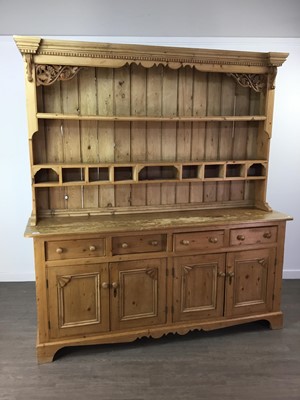 Lot 877 - A LARGE STRIPPED PINE DRESSER