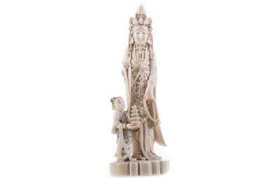 Lot 885 - A JAPANESE CARVED IVORY OKIMONO