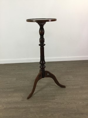 Lot 703 - A MAHOGANY TORCHERE