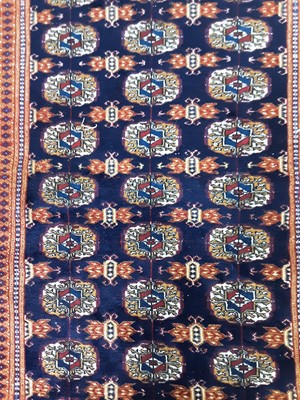 Lot 93 - A BOKHARA RUG