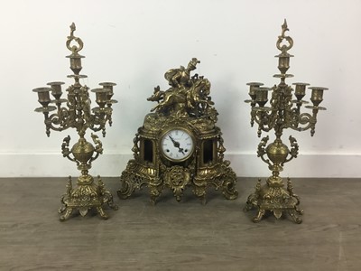 Lot 119 - A BRASS CLOCK GARNITURE
