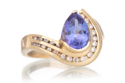 Lot 660 - TANZANITE AND DIAMOND RING
