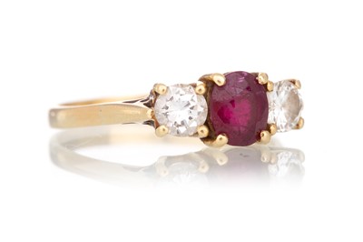 Lot 761 - RUBY AND DIAMOND THREE STONE RING
