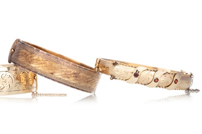 Lot 710 - THREE BANGLES