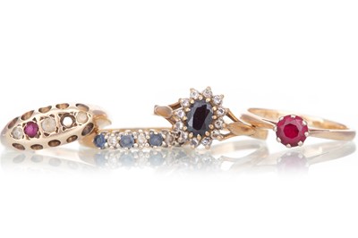 Lot 680 - FOUR GEM SET RINGS