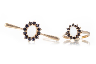 Lot 729 - SAPPHIRE AND OPAL RING