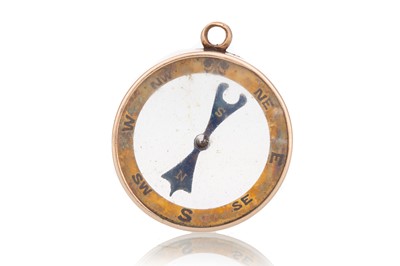 Lot 745 - COMPASS PENDANT