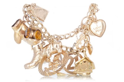 Lot 736 - CHARM BRACELET AND A GROUP OF LOOSE CHARMS