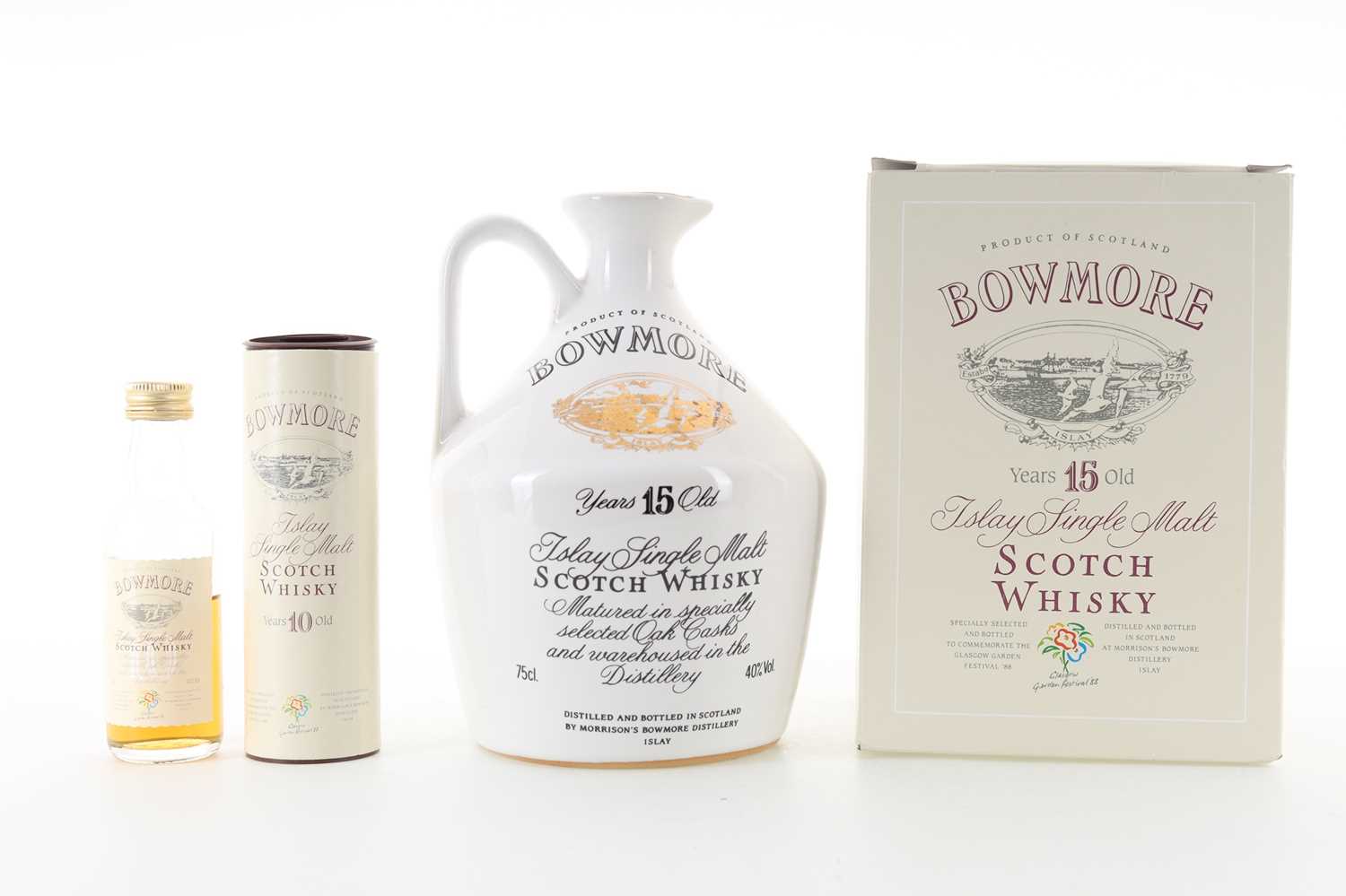 Lot 71 - BOWMORE 15 YEAR OLD GLASGOW GARDEN FESTIVAL DECANTER 75CL AND 10 YEAR OLD GARDEN FESTIVAL MINIATURE