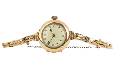 Lot 823 - EIGHTEEN CARAT GOLD MANUAL WIND WRIST WATCH